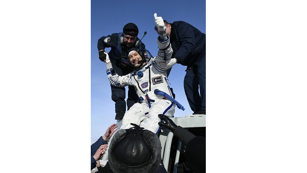 Record-breaking astronaut returns from six months in orbit (from import)